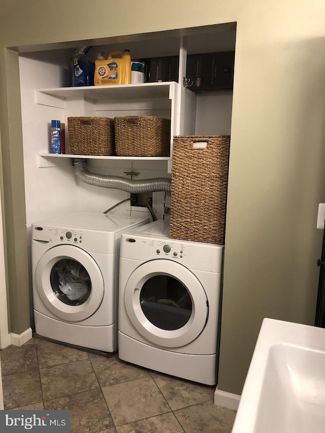 5814 Royal Ridge Dr Unit Q, Springfield, VA 22152 - washroom with tile patterned floors, laundry area, washer and clothes dryer, and baseboards