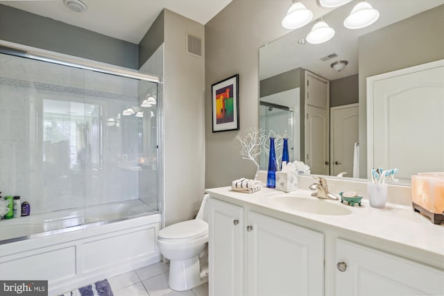 full bath with tile patterned floors, vanity, toilet, and visible vents