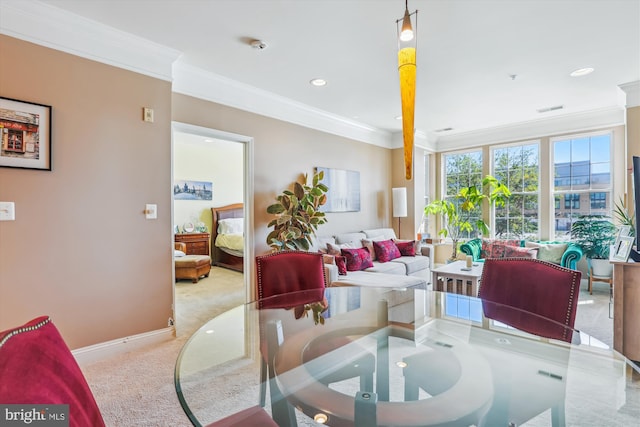 carpeted dining room with recessed lighting, baseboards, visible vents, and ornamental molding