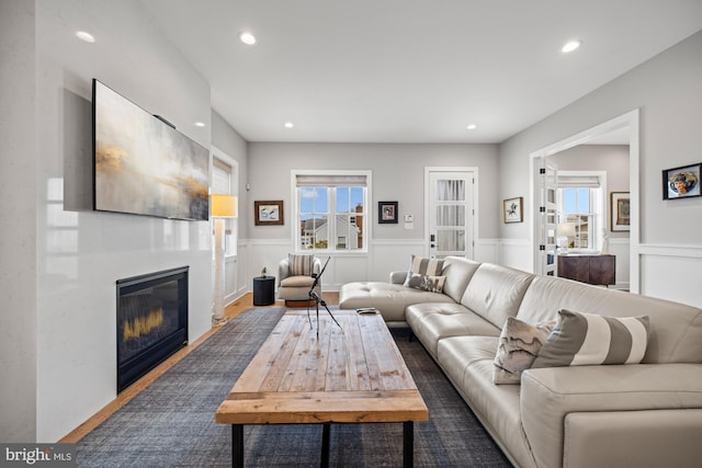 13 N Vendome Ave, Margate City, NJ 08402 - living area featuring a wainscoted wall, a glass covered fireplace, plenty of natural light, recessed lighting, and wood finished floors