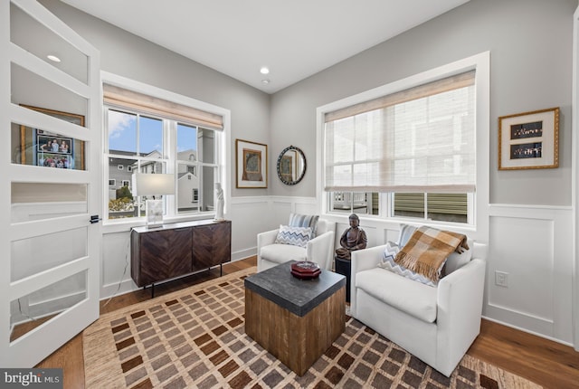13 N Vendome Ave, Margate City, NJ 08402 - living area with a decorative wall, dark wood-style flooring, wainscoting, and recessed lighting