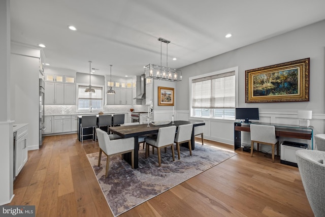 13 N Vendome Ave, Margate City, NJ 08402 - dining area featuring light wood-type flooring, wainscoting, recessed lighting, a decorative wall, and a desk