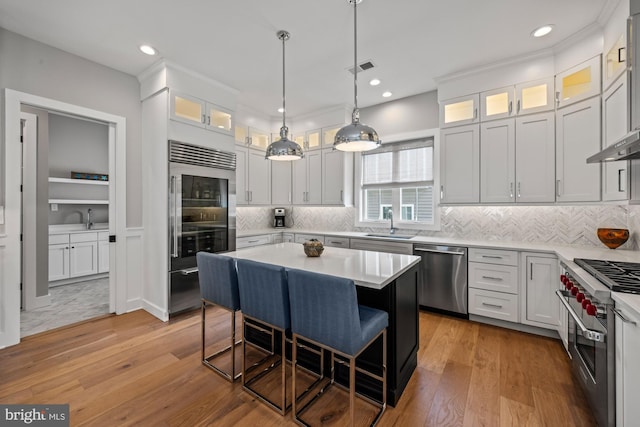 13 N Vendome Ave, Margate City, NJ 08402 - kitchen featuring high end appliances, a sink, light countertops, light wood finished floors, and recessed lighting