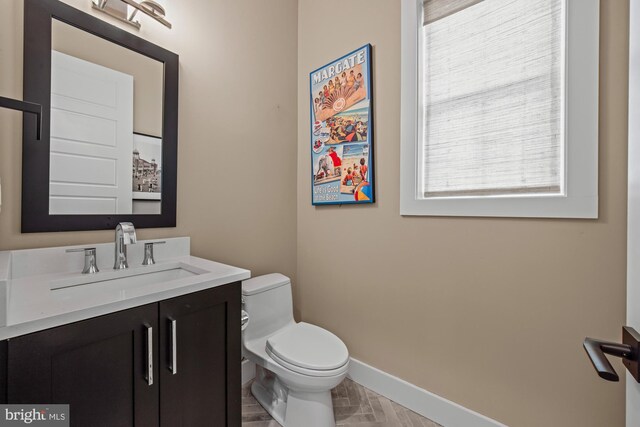13 N Vendome Ave, Margate City, NJ 08402 - bathroom featuring baseboards, toilet, and vanity