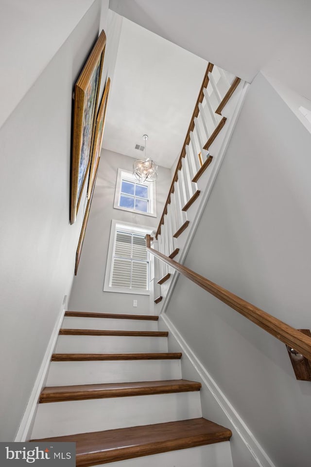 13 N Vendome Ave, Margate City, NJ 08402 - stairs with a chandelier