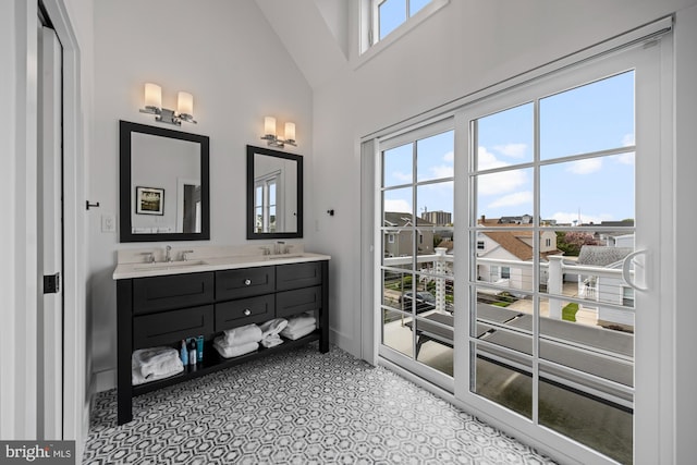 13 N Vendome Ave, Margate City, NJ 08402 - bathroom featuring healthy amount of natural light, baseboards, double vanity, and a towering ceiling