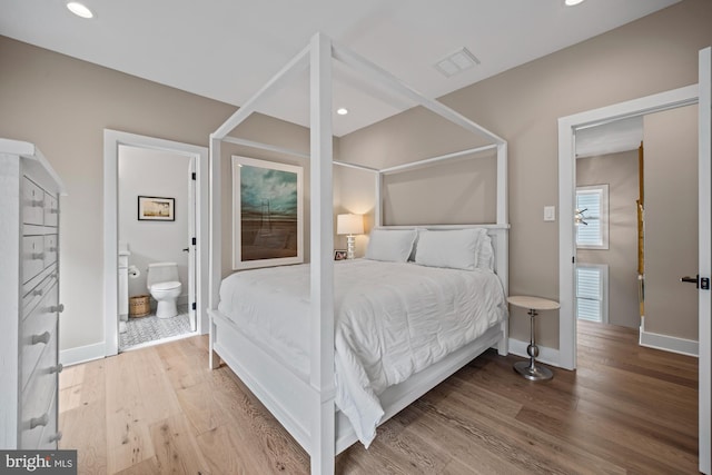 13 N Vendome Ave, Margate City, NJ 08402 - bedroom with wood finished floors, baseboards, ensuite bathroom, and recessed lighting