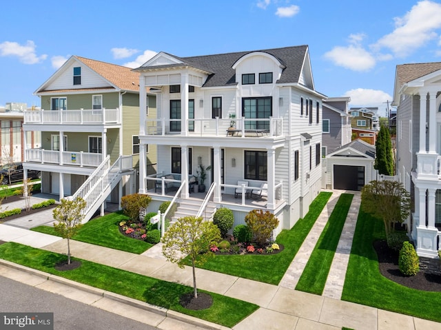 13 N Vendome Ave, Margate City, NJ 08402 - view of front facade featuring a balcony, a porch, driveway, and a shingled roof