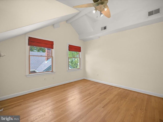 interior space featuring baseboards, light wood-style flooring, and visible vents