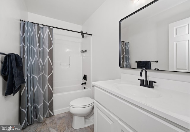 bathroom with vanity, shower / bath combination with curtain, and toilet