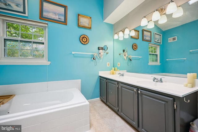 20003 Mattingly Ter, Gaithersburg, MD 20879 - bathroom with double vanity, tile patterned floors, and a bath