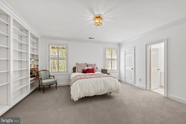 carpeted bedroom with crown molding, multiple windows, and baseboards