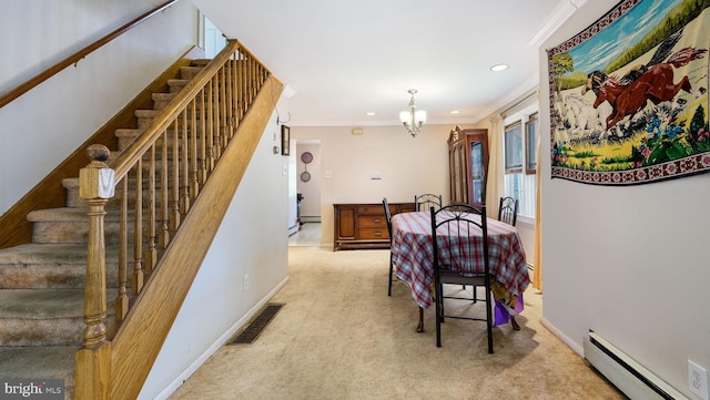 hallway featuring carpet floors, ornamental molding, a baseboard heating unit, and visible vents