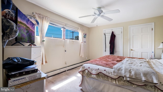 bedroom with a closet, a baseboard radiator, carpet floors, and ceiling fan