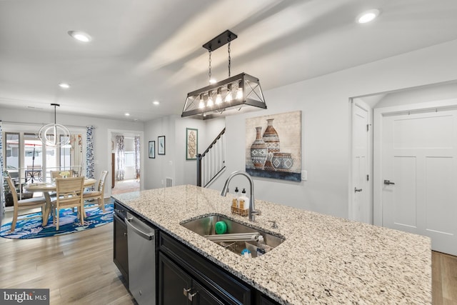 112 Maury Way, Winchester, VA 22602 - kitchen featuring a sink, dark cabinetry, recessed lighting, light wood-type flooring, and pendant lighting