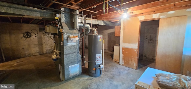 utility room featuring heating unit and water heater