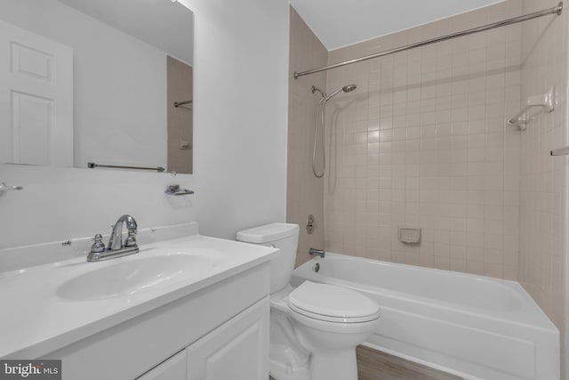 6703 Rapid Water Way Unit 203, Glen Burnie, MD 21060 - bathroom featuring vanity, toilet,  shower combination, and wood finished floors