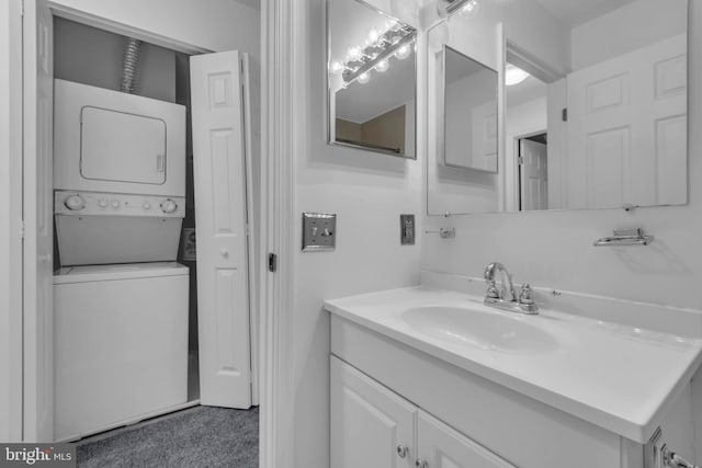 6703 Rapid Water Way Unit 203, Glen Burnie, MD 21060 - bathroom featuring stacked washer and clothes dryer and vanity