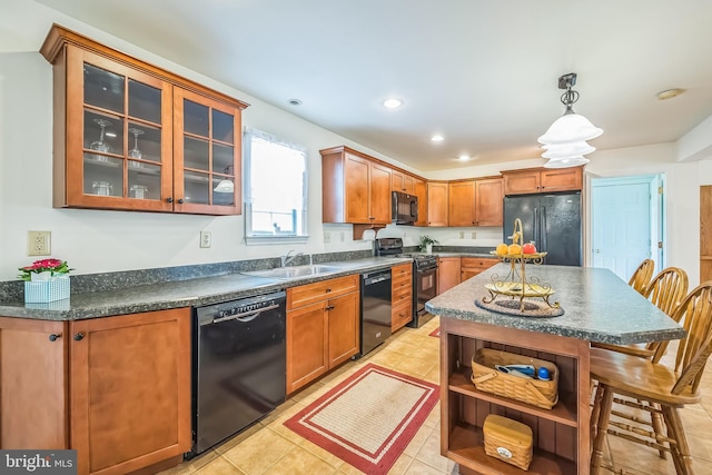 10 Shawnee Ln, Royersford, PA 19468 - kitchen with black appliances, dark countertops, a sink, open shelves, and glass insert cabinets