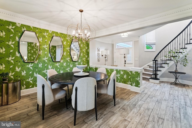 dining area with baseboards, stairway, wood finished floors, a chandelier, and crown molding