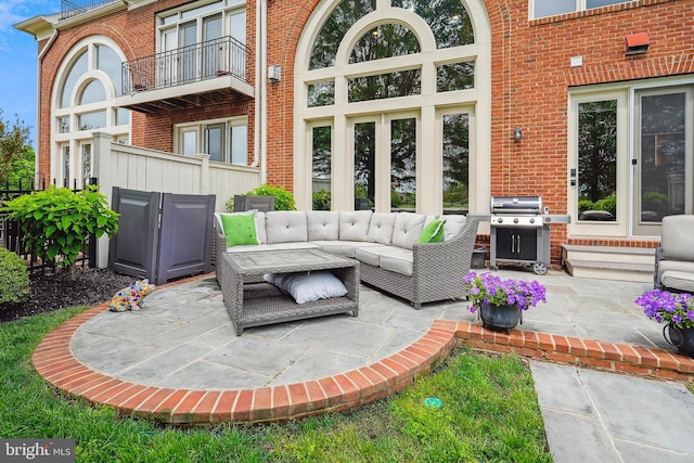 view of patio / terrace with a grill and an outdoor living space