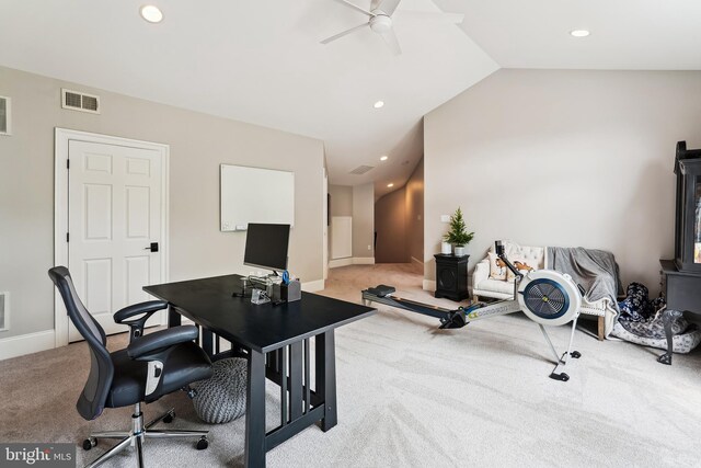 office space featuring light colored carpet, lofted ceiling, ceiling fan, recessed lighting, and baseboards