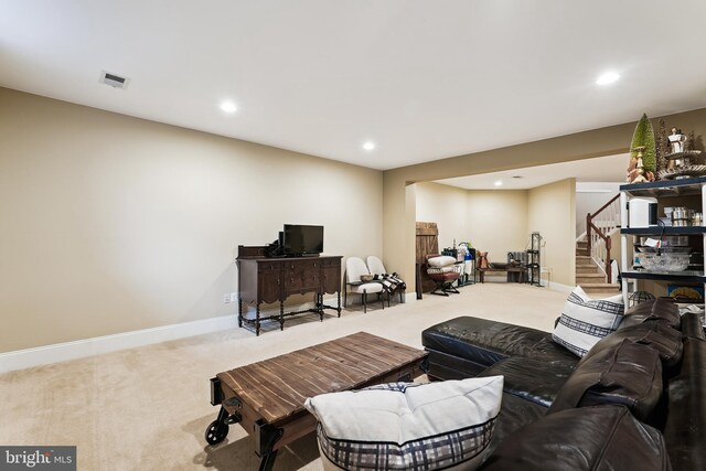 carpeted living room featuring stairway, recessed lighting, and baseboards