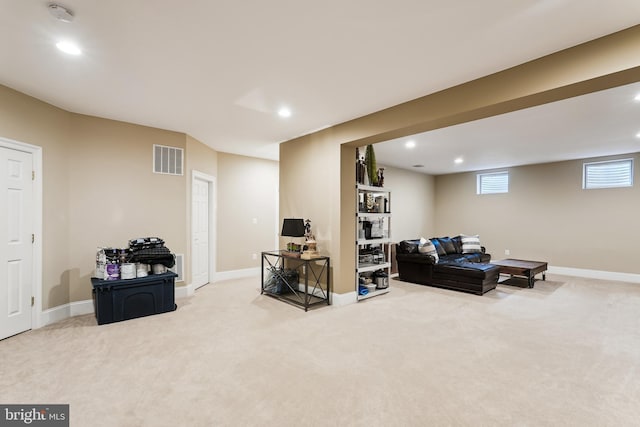 living room with carpet, recessed lighting, and baseboards