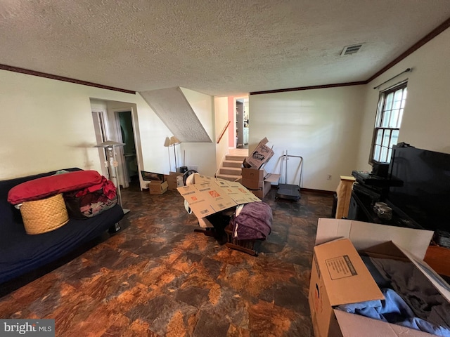 living room with a textured ceiling, visible vents, ornamental molding, and stairway