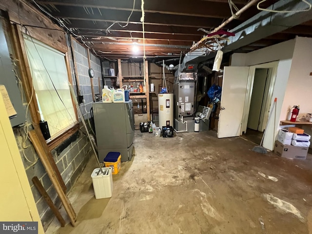 unfinished basement with heating unit and electric water heater