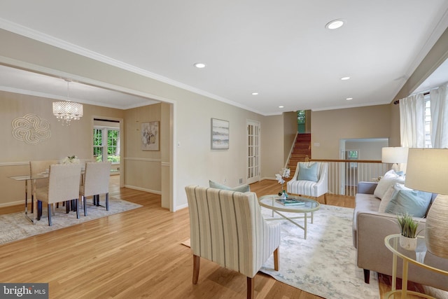 4303 S Valiant Ct, Annandale, VA 22003 - living room featuring healthy amount of natural light, light wood finished floors, a chandelier, recessed lighting, and ornamental molding