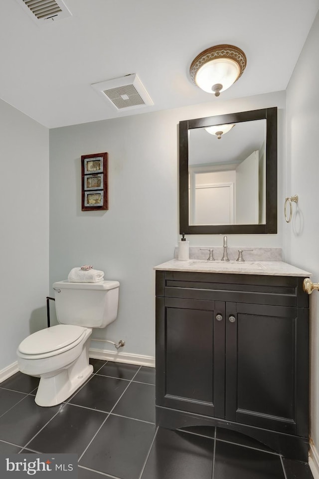 4303 S Valiant Ct, Annandale, VA 22003 - bathroom featuring baseboards, toilet, tile patterned flooring, and vanity