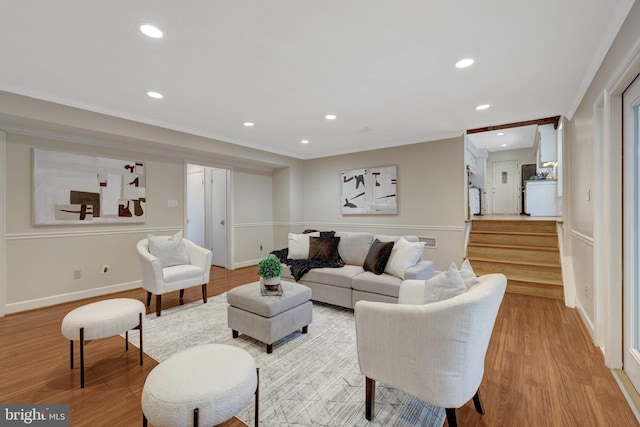 4303 S Valiant Ct, Annandale, VA 22003 - living room with light wood-style flooring, recessed lighting, crown molding, baseboards, and stairway
