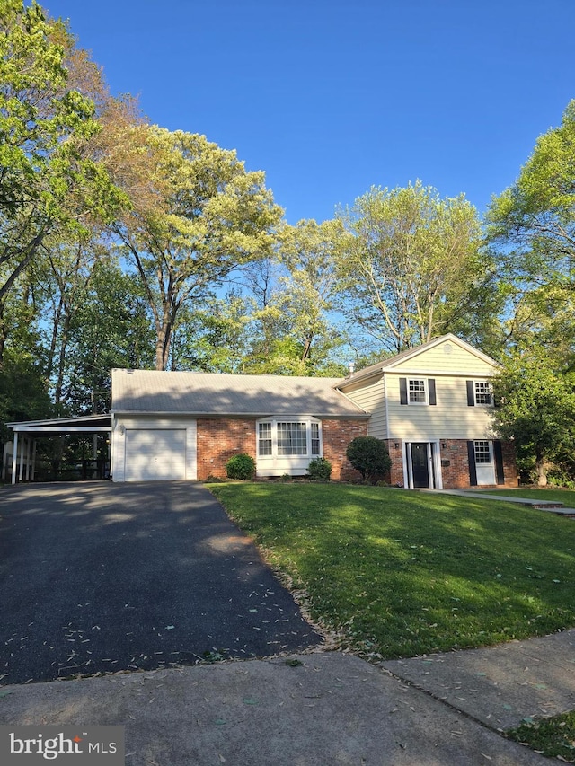 4303 S Valiant Ct, Annandale, VA 22003 - view of front facade with brick siding, asphalt driveway, a garage, a front yard, and a carport