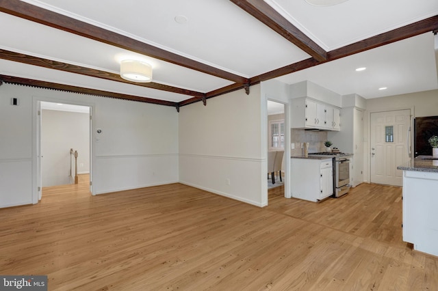 4303 S Valiant Ct, Annandale, VA 22003 - unfurnished living room with light wood-style flooring, beamed ceiling, and baseboards