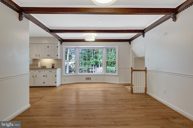 4303 S Valiant Ct, Annandale, VA 22003 - additional living space with beamed ceiling, light wood-style flooring, and baseboards