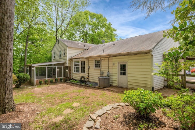 4303 S Valiant Ct, Annandale, VA 22003 - back of house with a sunroom, central AC unit, and roof with shingles