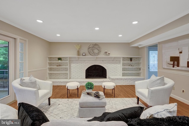 4303 S Valiant Ct, Annandale, VA 22003 - living room featuring a fireplace, wood finished floors, recessed lighting, crown molding, and baseboards