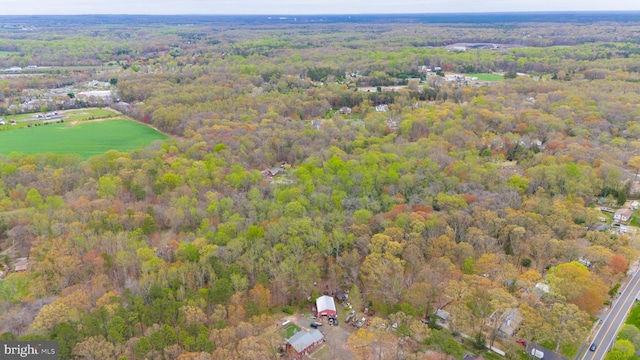 aerial view featuring a view of trees
