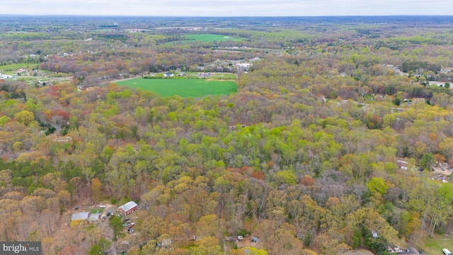 aerial view featuring a view of trees