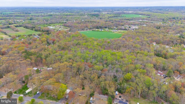 aerial view with a wooded view
