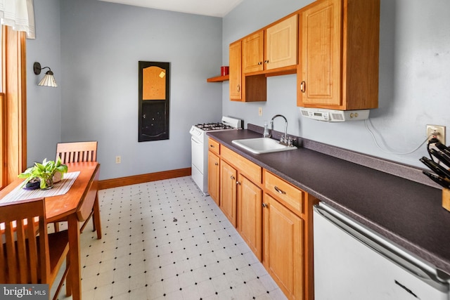 kitchen with a sink, white gas range oven, dishwashing machine, dark countertops, and light floors