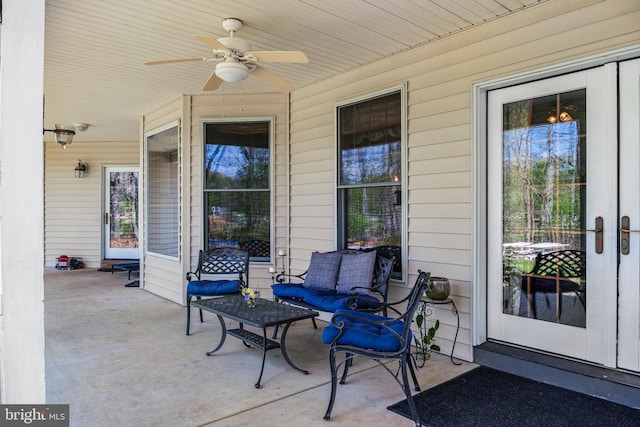 view of patio featuring outdoor lounge area and ceiling fan