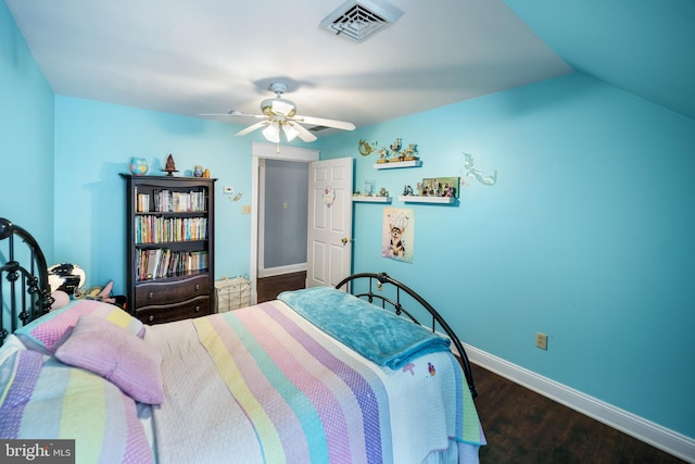 bedroom with baseboards, visible vents, ceiling fan, and dark wood-type flooring