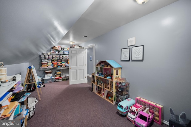 rec room with lofted ceiling and carpet