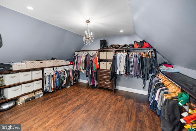 walk in closet featuring lofted ceiling and dark wood-style floors