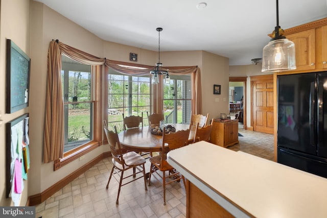 dining room featuring baseboards