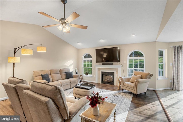 6815 Interlude Pl, Hughesville, MD 20637 - living room featuring vaulted ceiling, ceiling fan, a wealth of natural light, and light wood-type flooring