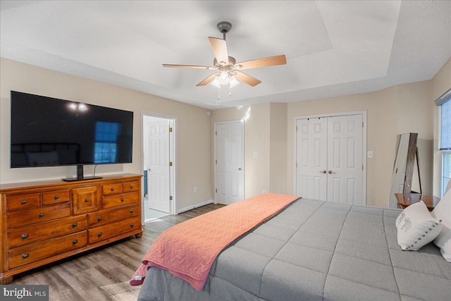 6815 Interlude Pl, Hughesville, MD 20637 - bedroom with baseboards, wood finished floors, a ceiling fan, and a closet