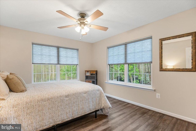 6815 Interlude Pl, Hughesville, MD 20637 - bedroom featuring baseboards, a ceiling fan, and dark wood-style flooring